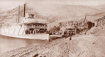 Anne Faxon being loaded with sacks of grain at a Snake River landing.